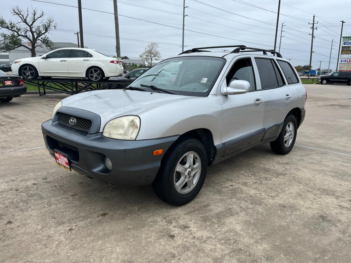 2003 SILVER /gray Hyundai Santa Fe GLS (KM8SC13D53U) with an 2.7L V6 DOHC 24V engine, 4-Speed Automatic Overdrive transmission, located at 14700 Tomball Parkway 249, Houston, TX, 77086, (281) 444-2200, 29.928619, -95.504074 - Photo#2